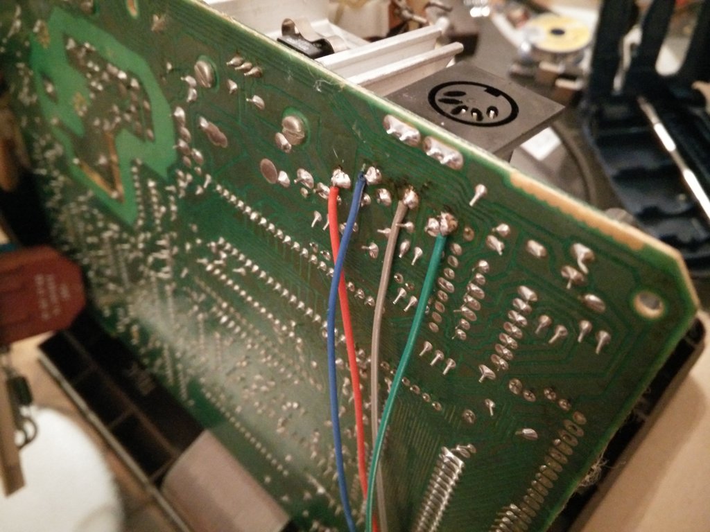 Power, ground, TX, and RX wires soldered to the Minitel motherboard