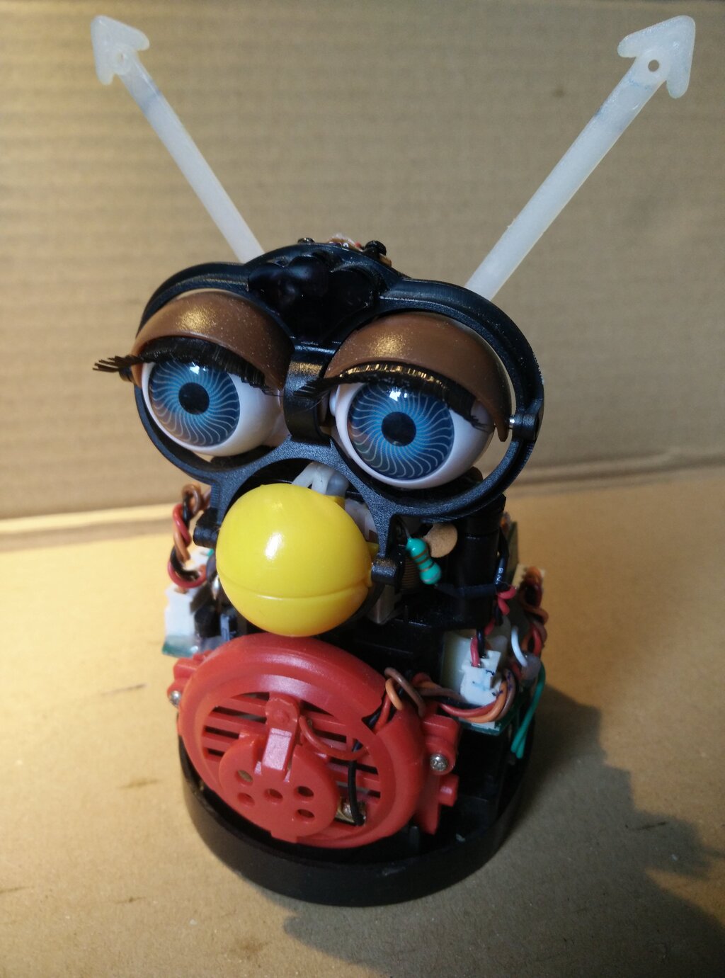The original Furby with its fur and carapace removed